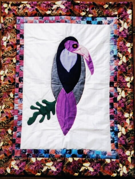 "Toucan," a quilt by Sally Eklund