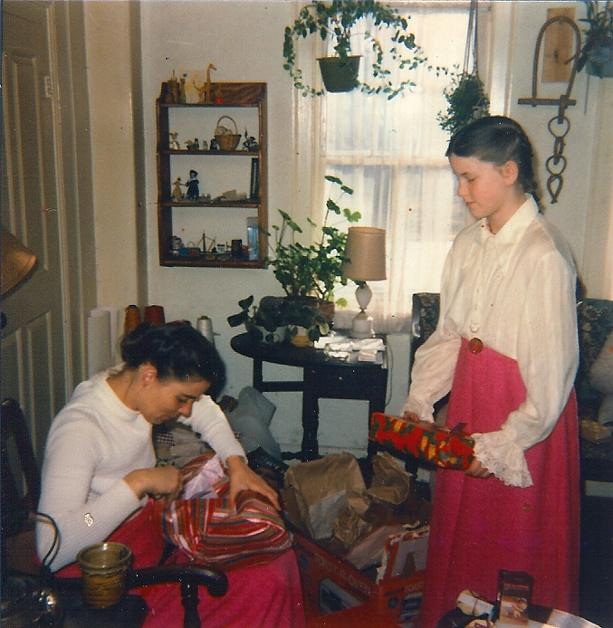 opening gifts with daughter in the 1970s