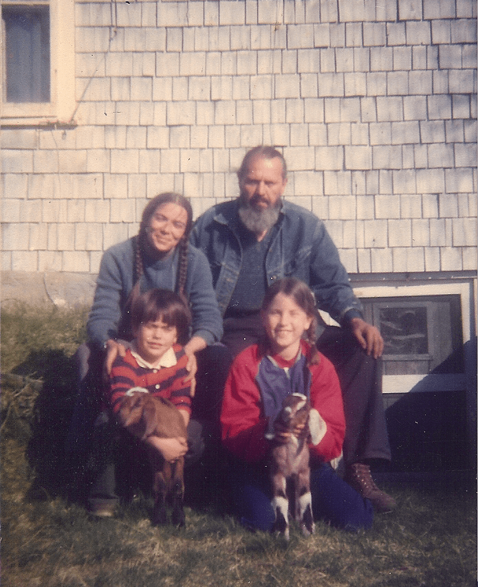 with husband, children, and pet goats