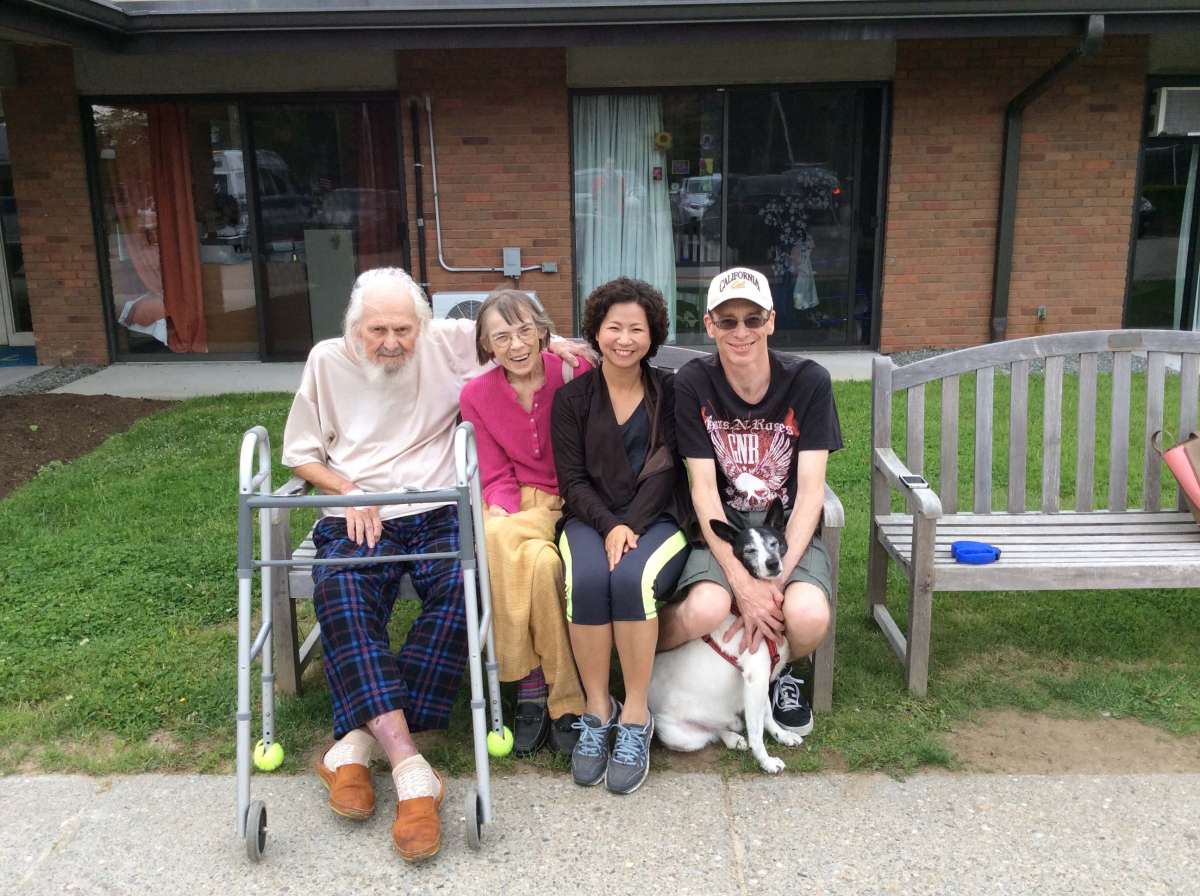 with husband, daughter-in-law, and older son in 2014