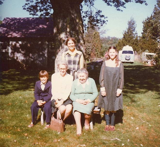 with youngest two children, mother-in-law, and family friend in the 1980s